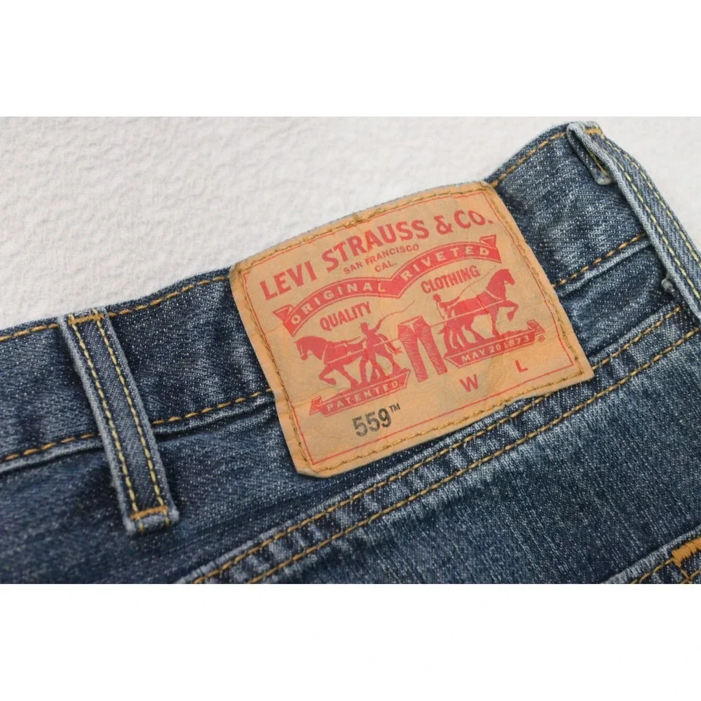Levi's 559 Relaxed Straight Jeans Mens 46x32 Blue Denim‎ Medium Wash Excellent